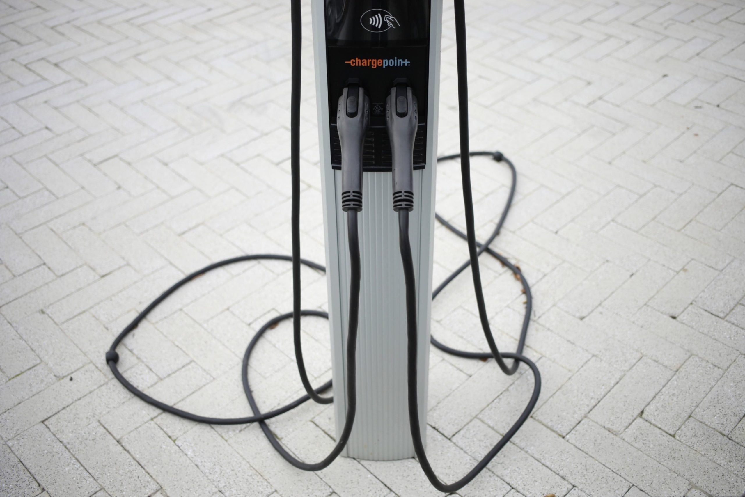 A ChargePoint electric vehicle (EV) charging station at the Mercedes-Benz of Louisville dealership in Louisville, Kentucky, U.S., on Tuesday, Dec. 7, 2021. U.S. car sales inched higher and inventories grew in October, a sign that some of the worst of the shortages hampering auto production might be fading, but auto makers continued to struggle to replenish dealer lots and supply is likely to remain tight through next year, according to MarketWatch.